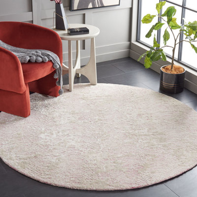 Tapis ivoire en laine et en coton touffeté à la main Glamour