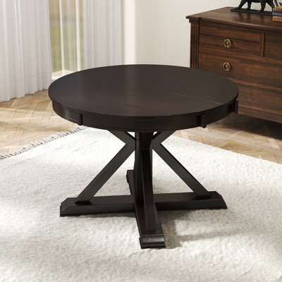 Round And Oval Extendable Dining Table by August Grove