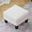 Repose-pieds en tissu beige