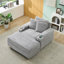 Canapé simple confortable avec coussins, repose-pieds et espaces de rangement, idéal pour se détendre et organiser votre espace de vie