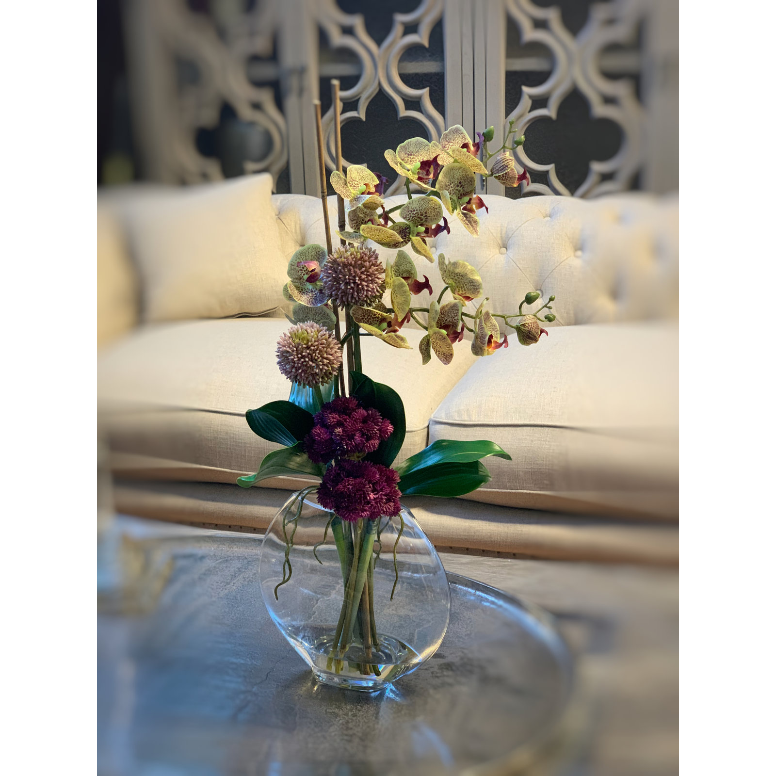 Orchid and Sedum Floral Arrangement in Vase