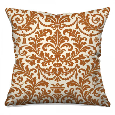 Coussins décoratifs ornés de motifs damassés