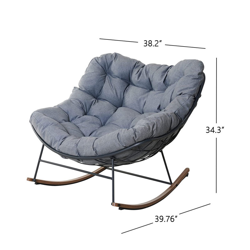 Chaise berçante d'extérieur en métal avec coussins