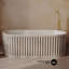 Baignoire autoportante en sable Delice de 67 po avec drain Delice