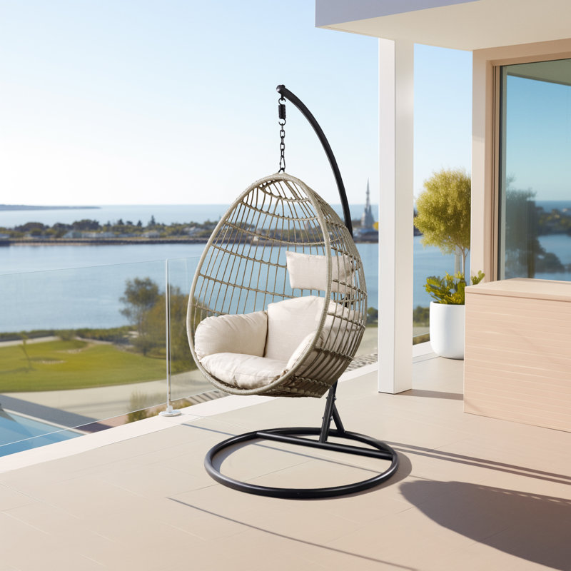 Chaise suspendue d'extérieur avec support en tissu et osier Dakarai