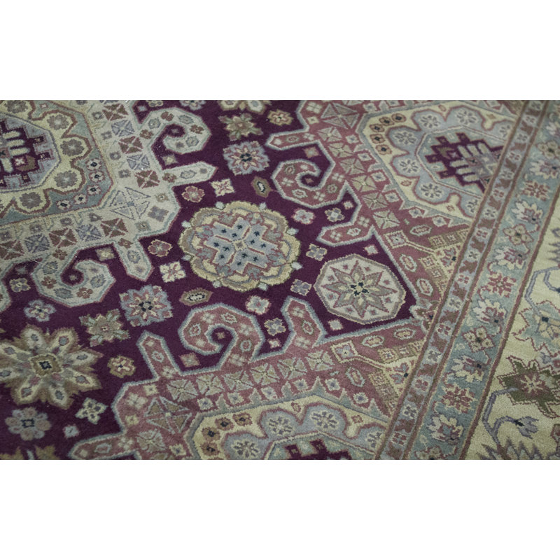 Tapis rouge et or de haute qualité noué à la main