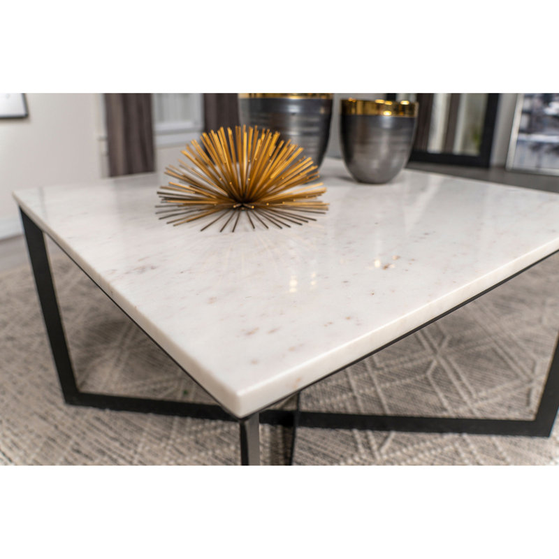 Table basse Volz avec plateau carré en marbre blanc et noir Volz