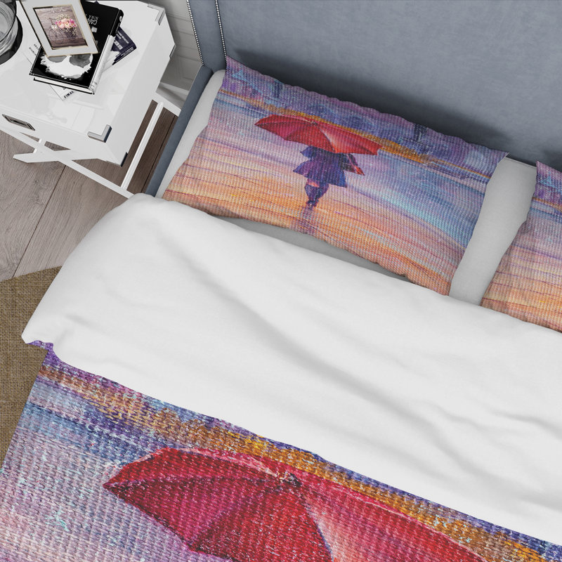Femme marchant avec un parapluie rouge sous la pluie - ensemble de housse de couette française - microfibre de polyester