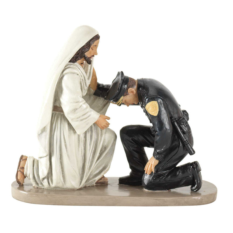 Figurine Jésus et agent de police