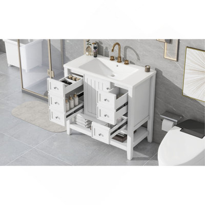 Meuble-lavabo élégant avec lavabo, tiroirs et armoire pour un décor de salle de bain fonctionnel et élégant.