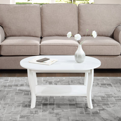 Carbin 36" Oval Coffee Table with Shelf
