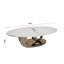 Table basse en marbre avec base sculpturale en acier inoxydable-348718323