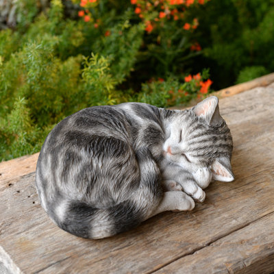 Nocturnal Elegance: Black Polyresin Sleeping Cat Figurine