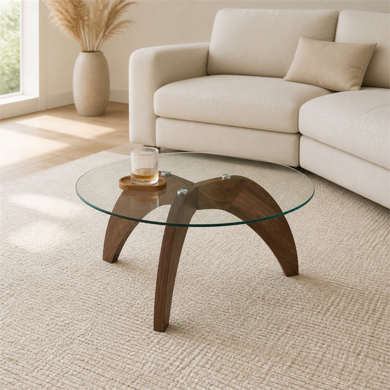 Table basse ronde de 27,6 po avec pieds en trépied - plateau en verre trempé transparent et panneau de fibres à densité moyenne à finition noyer; table basse de salon créative et décontractée