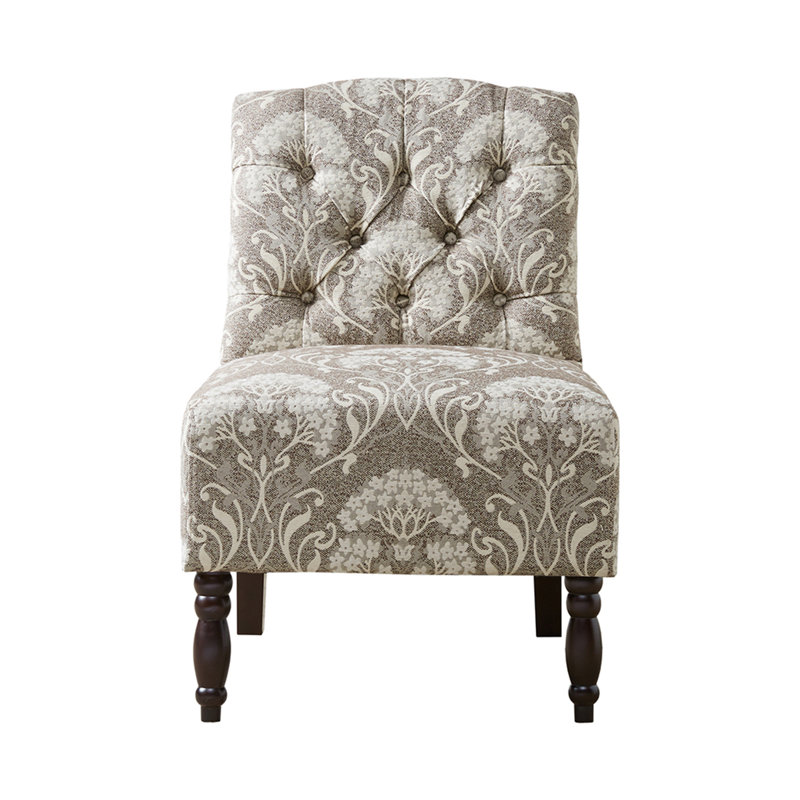 Fauteuil capitonné sans accoudoirs