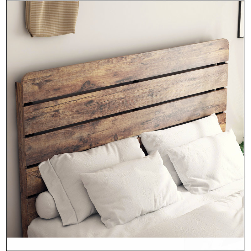 Structure de lit plateforme en bois avec grand espace de rangement sous le lit, rehaussant l'esthétique et la fonctionnalité dans votre chambre à coucher