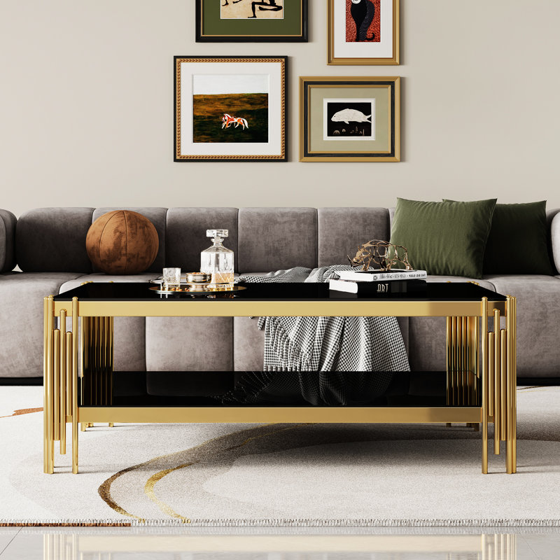 Élégante table basse en verre trempé avec structure en acier inoxydable noir et doré et double couche durable facile à nettoyer