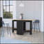 Table de salle à manger Cole Black et Macadamia pliante, peu encombrante et élégante pour une vie moderne et un rangement facile.-326748612