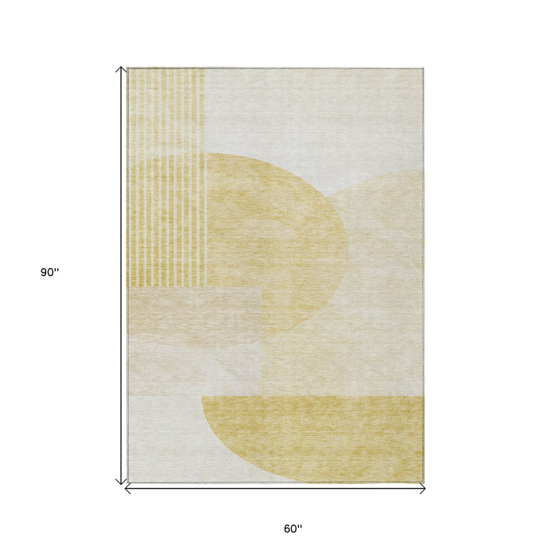 Tapis intérieur / extérieur géométrique lavable 5 pi x 8 pi doré et ivoire