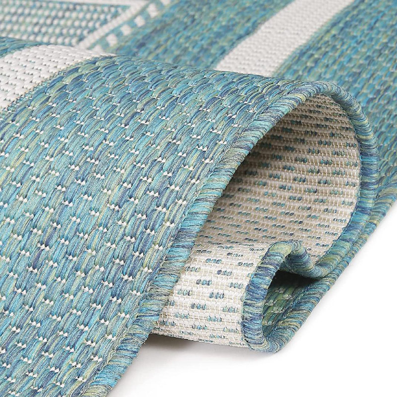 Tapis intérieur / extérieur gris / bleu clair en polypropylène Alxavier