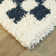 Barrile Chequered Machine Woven Area Rug