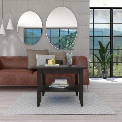 Table basse noire avec une tablette et quatre pieds