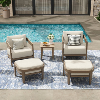 Ensemble de conversation en aluminium avec coussins et repose-pieds Harmonti