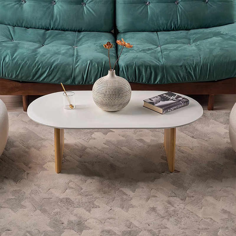 Table basse blanche en bois massif ovale