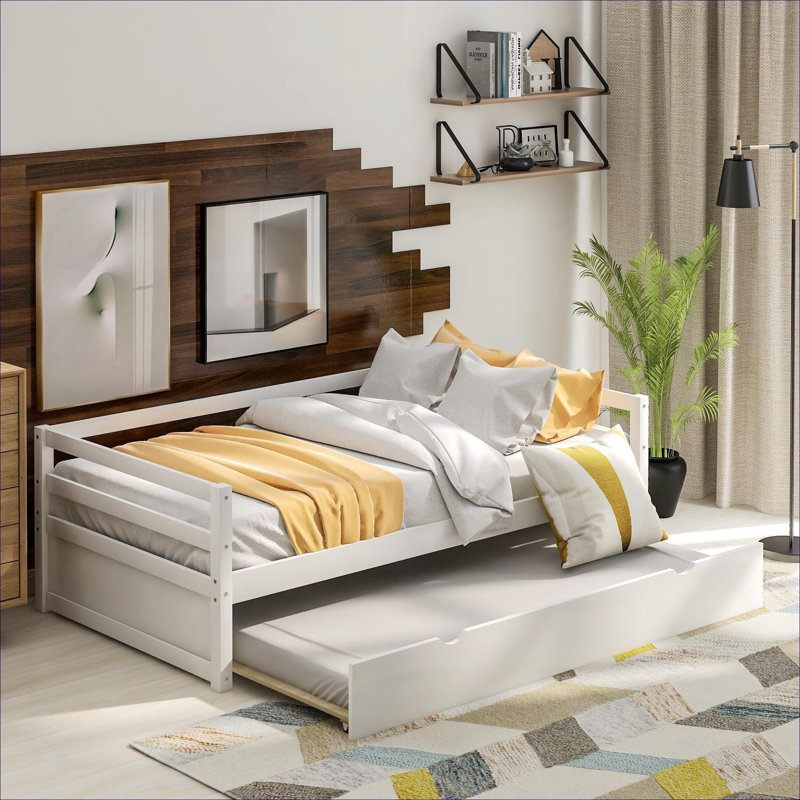 Lit de jour simple en pin massif blanc doux avec lit gigogne escamotable, conception peu encombrante pour les petites chambres et les chambres d'amis