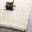 Tapis à poil long ivoire fabriqué à la main Assar-23564285