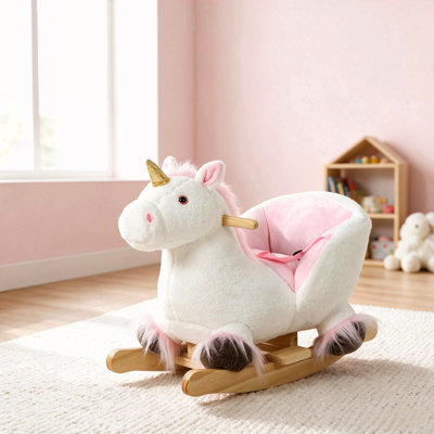 Licorne à bascule en peluche interactive adaptée aux tout-petits, un jeu sécuritaire et stimulant pour le développement musculaire et l'équilibre.