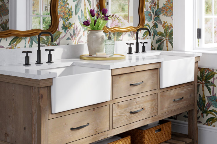 double vanity with farmhouse sinks in a bathroom with tropical wallpaper