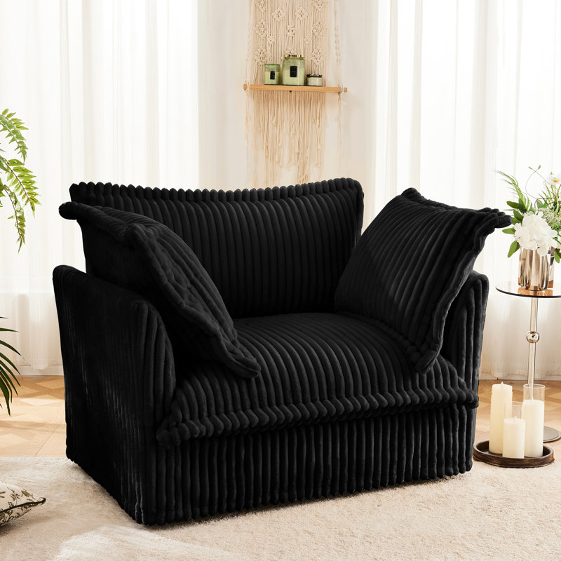 Fauteuil noir en velours côtelé et fauteuil élégant en tissu doux noir