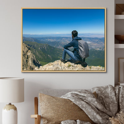 " Young Man Hiking Mountain "