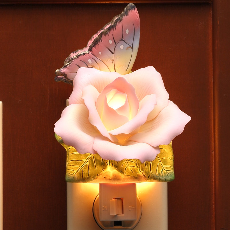 Papillon avec veilleuse paix rose