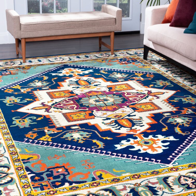 Colorful area rugs take the floor when decorating a room