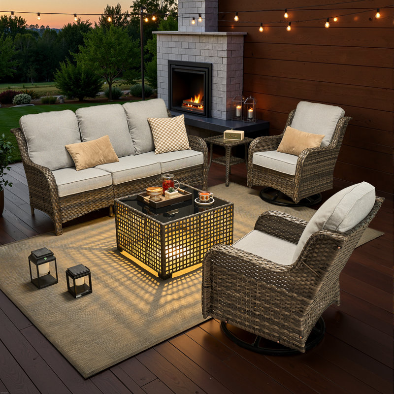 Ensemble de meubles de patio en osier toutes saisons 6 pièces Cracraft avec chaises berçantes pivotantes, canapé à assise profonde et table basse illuminée pour les soirées de jardin, de patio et de piscine
