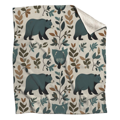 Ours avec couvertures à feuilles
