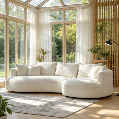 125" Curved Boucle Sectional Sofa With Chaise And 7 Pillows