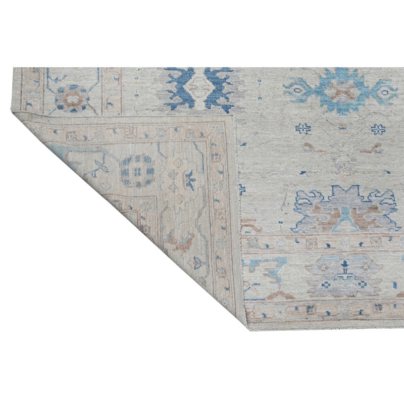 Tapis bleu clair noué à la main de haute qualité