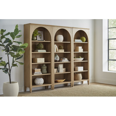 Gayle Solid and Manufactured Wood Standard Bookcase with Arched Side Panels and Adjustable Shelves