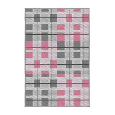 Tapis rose/vert à motifs