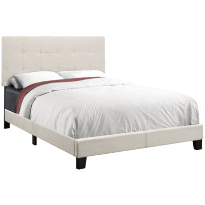 Lit en tissu d'ameublement en lin beige avec pieds en bois noir pour le revêtement de la chambre à coucher