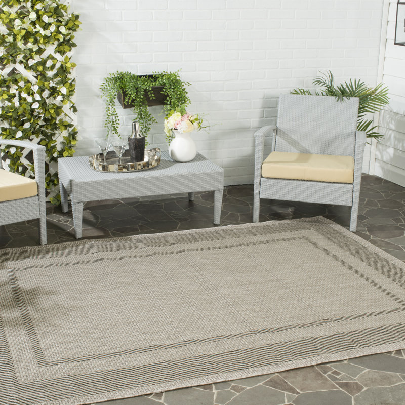Tapis d'intérieur / extérieur de couleur unie Reid Performance, Rectangle 6 pi 7 po x 9 pi 6 po, Beige/Black