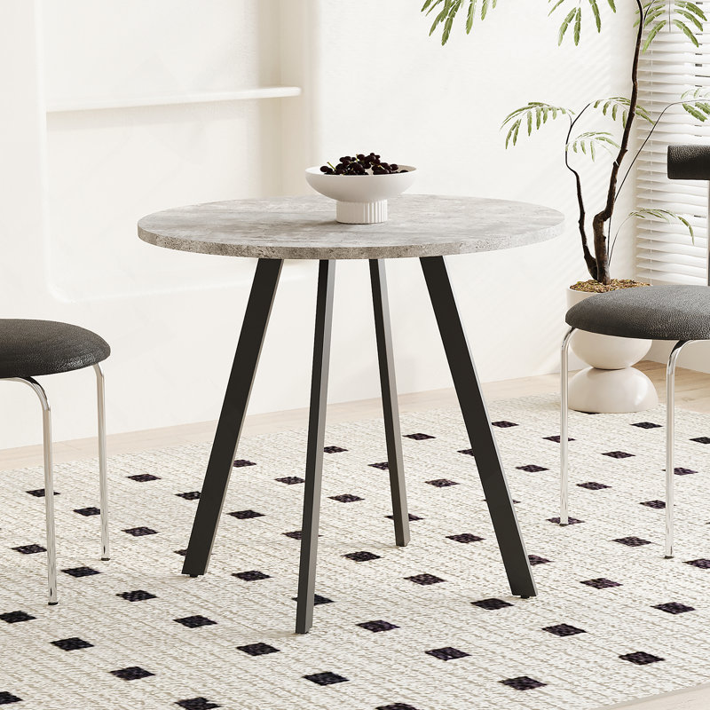 Table de salle à manger moderne et minimaliste circulaire, texture ciment gris, convient aux restaurants, cuisines et bureaux