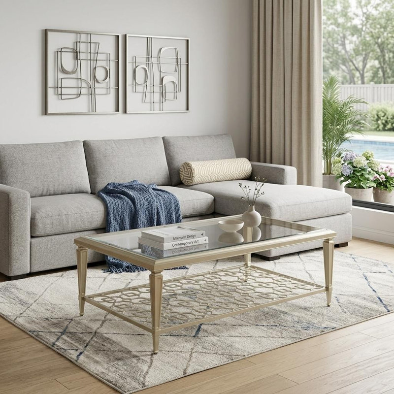 Table basse 54 "en verre transparent et champagne et acier