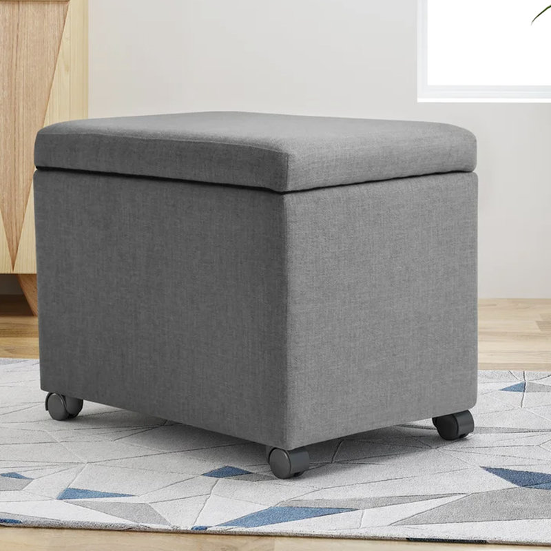 Rangement en tissu gris avec roulettes pour une utilisation polyvalente à la maison et au bureau