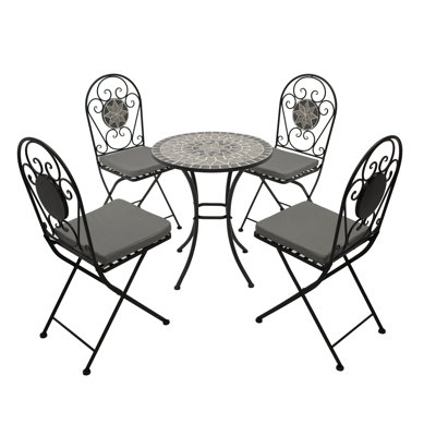Stacy 4 - Person Round Ceramic Patio Dining Set with Cushions included