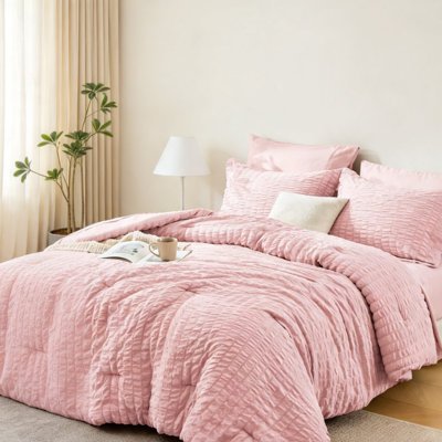 Ensemble de couette rose 7 pièces en seersucker pour lit queen