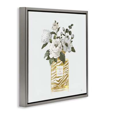 Cadre flottant chic avec bouquet de parfums, design par Nan